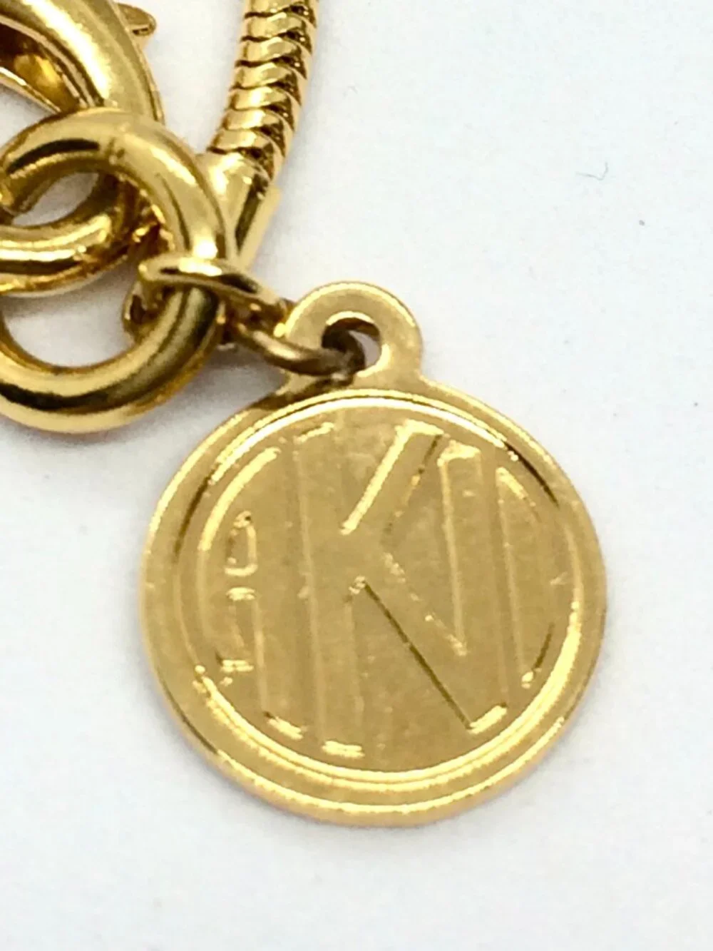 VINTAGE ANNE KLEIN Necklace Gold Tone XO Pendant Long Snake Chain